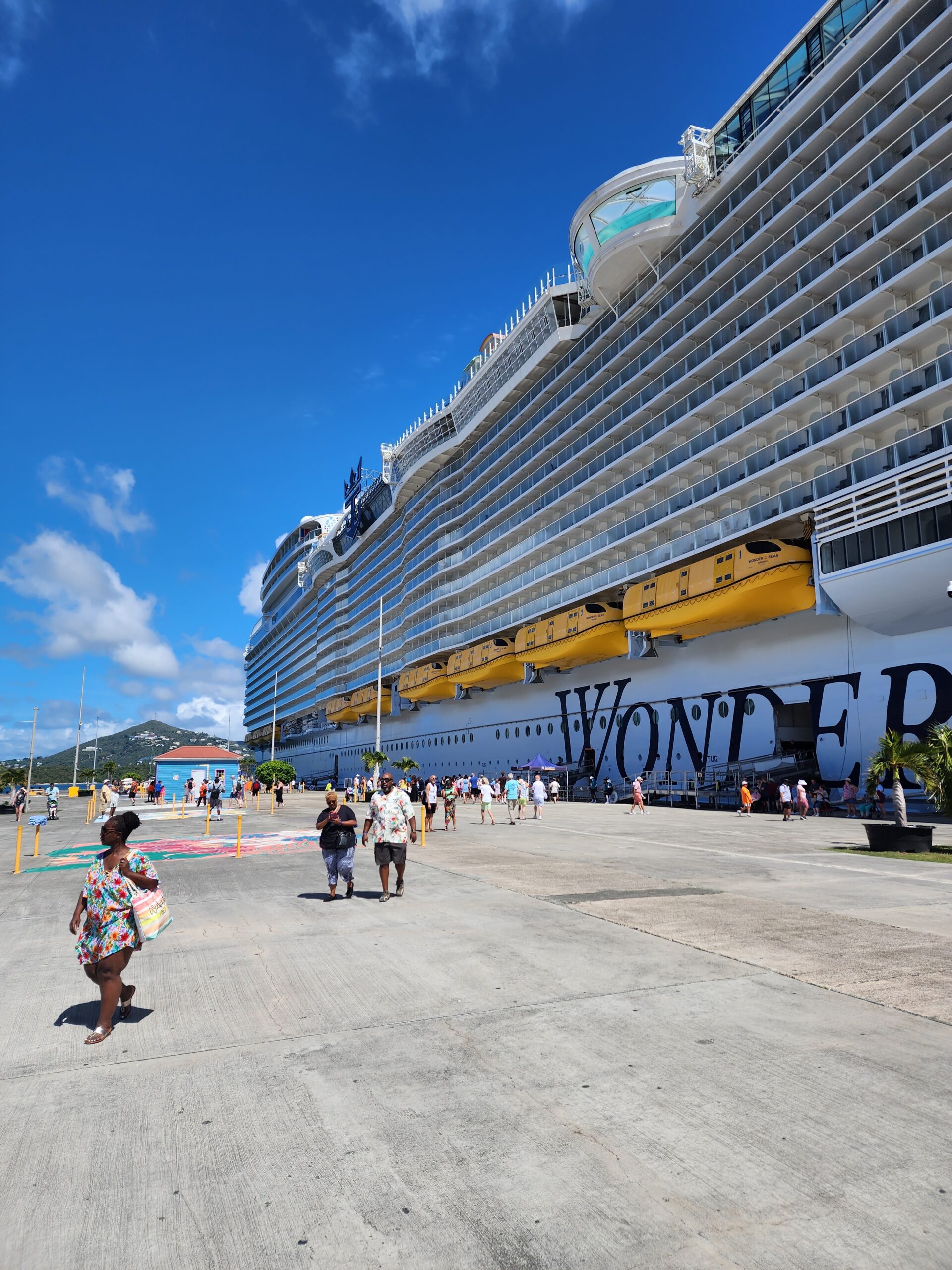 on the pier next to a cruise ship in st. thomas