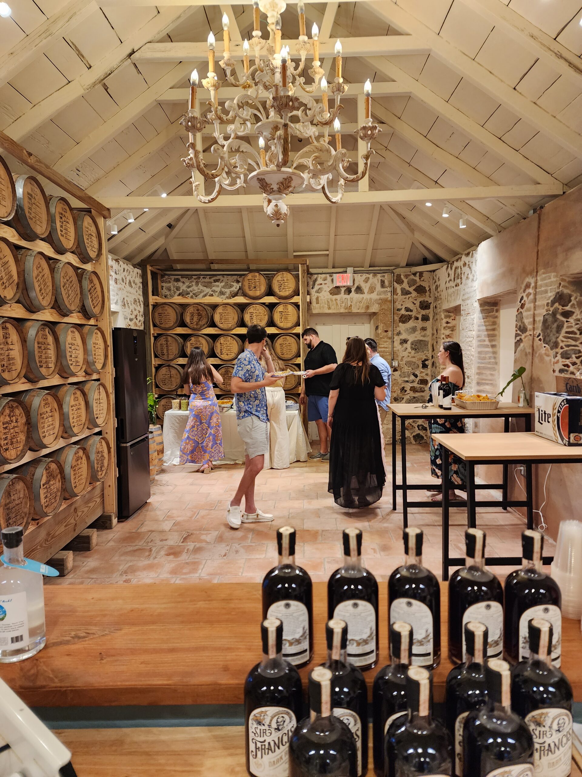 A distillery and rum barrels are now where slaves used to live